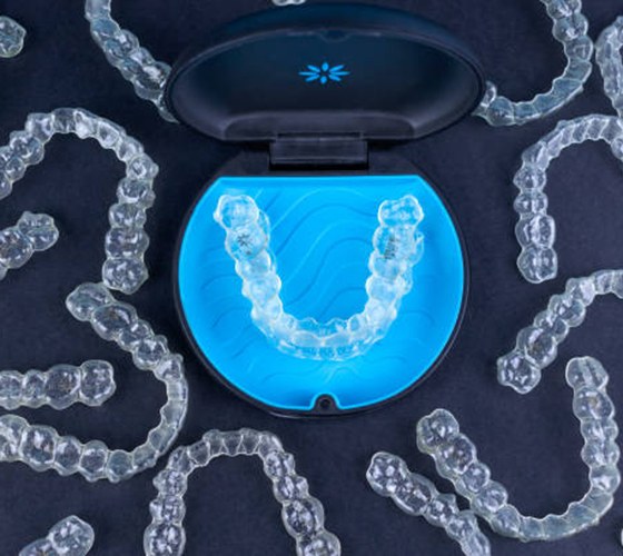 Clear aligners on black background