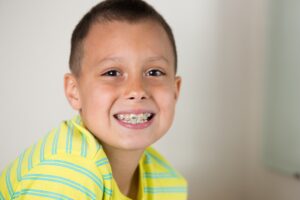 Smiling boy with braces
